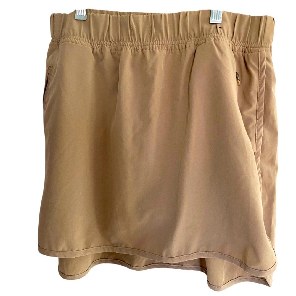 Woman’s skort ZeroXposur Active Skort Tan 2 Zip Pockets Mesh Lining Shorts small